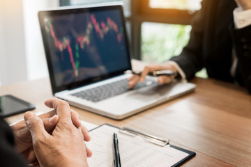 Finance trade manager showing reports screen analysis finance currency data on stock trade graph on business currency market