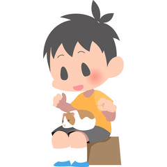 膝の上にモルモットを乗せる男の子