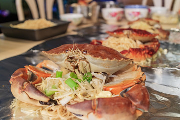 Stone crab prepared in aluminum foil