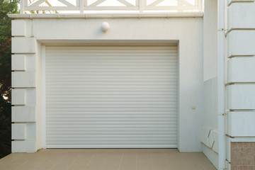 White automatic garage doors are closed