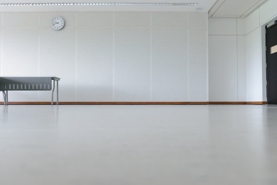 Empty Room Modern Interior - Floor With Soundproof Wall, Door, Clock And Table