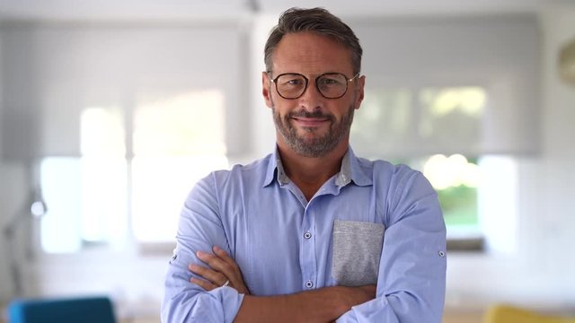 Portrait of smiling mature man with eyeglasses 