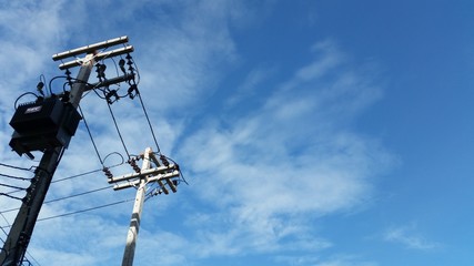 high voltage electric pole nice blue sky background