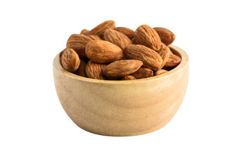 Group of Peeled almonds in wooden bowl