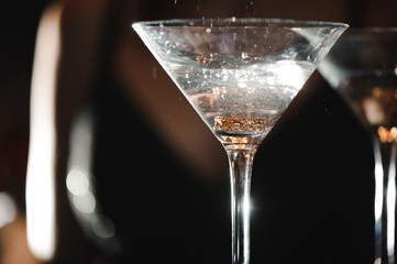 A martini glass with a ring