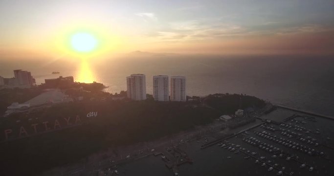 Pattaya City in Thailand at Sunset, Aerial Pullback Shot
