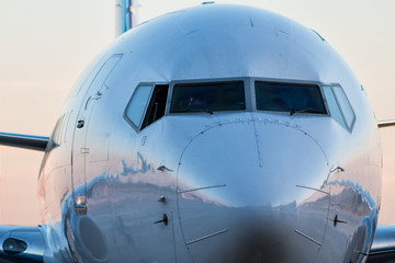Close-up front of the fuselage of the passenger airplane