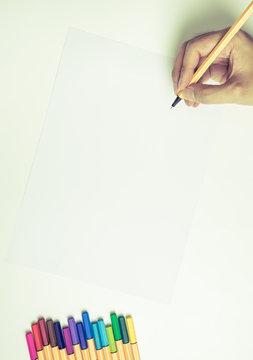 Hand writing on blank pepar with color pens