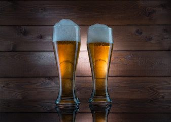 Two glasses of golden beer