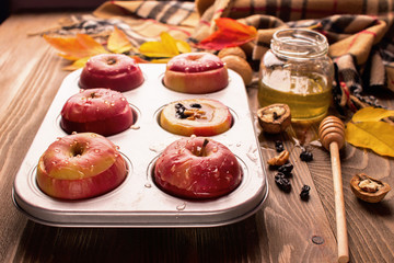 Baked apples stuffed with nuts raisins and honey.