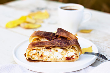 Strudel, pie with cheese. Autumn decoration.