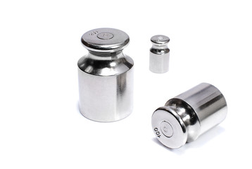 Iron weights for scales isolated on white background