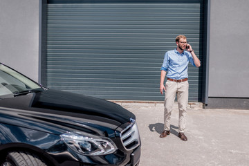 man standing near the car