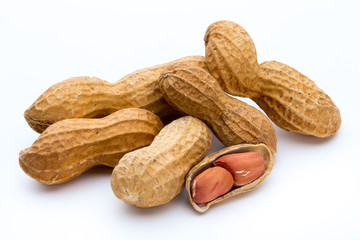 Dried peanuts on the white background.