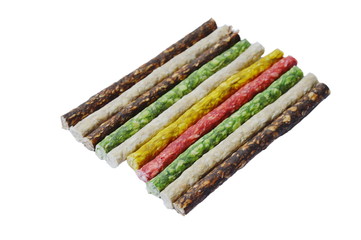 dog snack crunchy stick made from cow skin and bone on white background