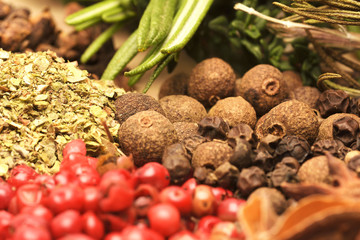 Wooden table of colorful spices. Set of various aromatic colorful spices and herbs