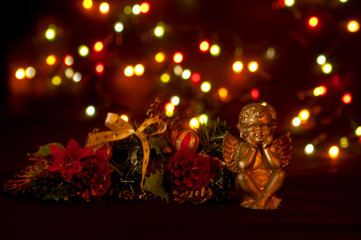 An angel candle and christmas decoration. Copy space.