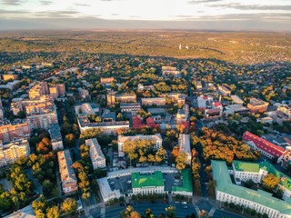 Fototapeta premium Aerial panoramic view on central park in Poltava city, Ukraine. Sunset, low light image.