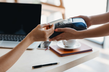 Fototapeta premium Payment with credit card and terminal