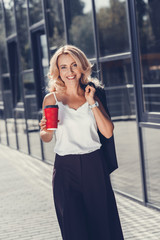 businesswoman with paper cup