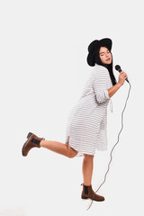 sexy women in a hat with  microphone