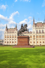 Beautiful view of the monument to Ferenc II Rakoki in the square of Lajos Kosuta in front of the Hungarian Parliament in Budapest, Hungary