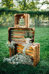Hand made wedding decorations with wooden boxes,