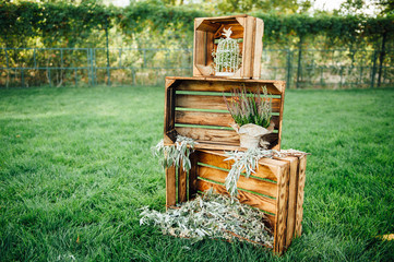 Hand made wedding decorations with wooden boxes,