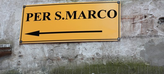 Street sign with directions to go to Sqaure of Sanint Mark in Ve