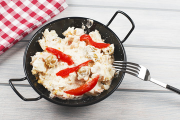 Typical dish of spain, russian salad with fork. Mediterranean diet.