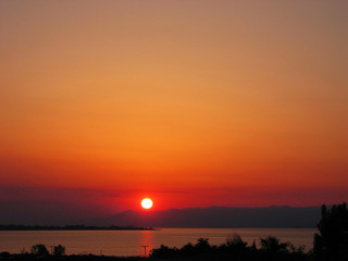 Amazing Sunset Sunrise With Sun Over Sea