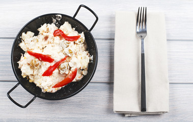 Typical dish of spain, russian salad with fork. Mediterranean diet.