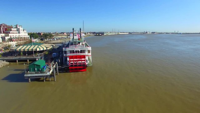 NEW ORLEANS, LA - FEBRUARY 2016: Aerial view of Riverboat Natchez docked in Mississippi River at New Orleans.