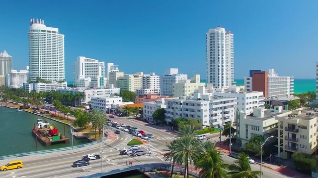 MIAMI, FL - FEBRUARY 2016: Aerial view of Miami Beach buildings along the river. Miami attracts 15 million tourists annually.