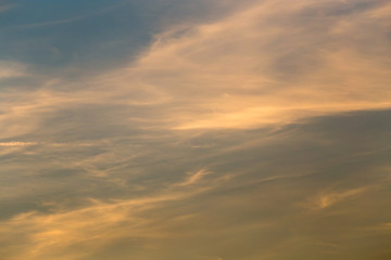 clouds in the sky at sunset as background