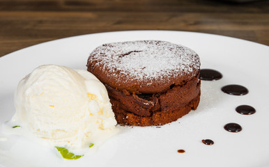 chocolate fondant on a wooden background.