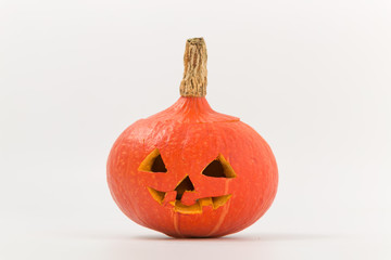 holiday halloween. pumpkin with carved on it a mug.