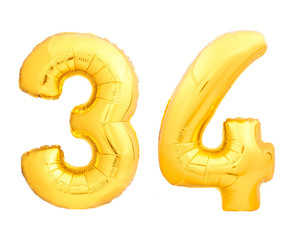 Golden number 34 thirty four made of inflatable balloon