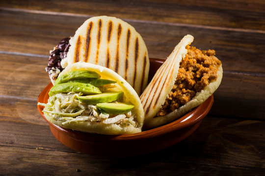 Venezuelan Arepas In Budare On Tablecloth Stock Photo - Download