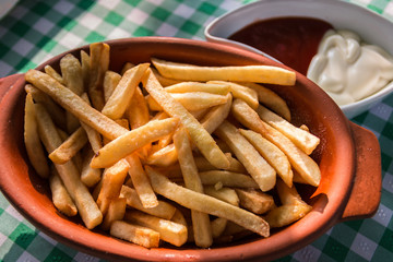 French fries with ketchup and mayonnaise