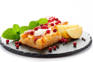 Apple cake with cream, jam and forest berries