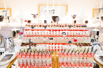Different kinds of baked sweets on a buffet
