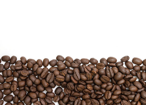 Coffee beans for background isolated on white. Close up image and high resolution.