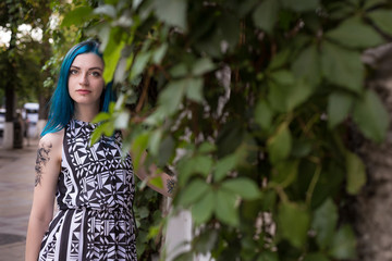 Goth punk beautiful girl with blue hair