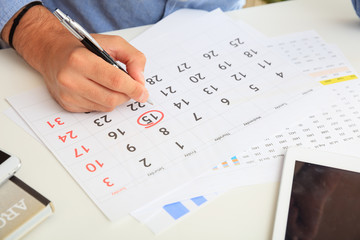 Man marked15th day on the calendar