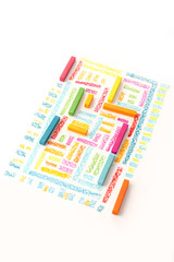 Photo of a cute geometric pattern made of colorful pastel chalks