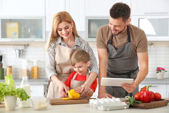 Family cooking in kitchen. Cooking classes concept