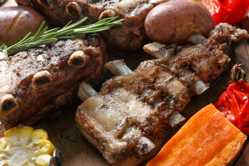 Grilled ribs and vegetables, closeup