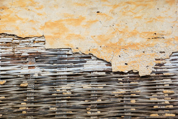 Abstract vintage wallpaper of yellow cement and bamboo wood 