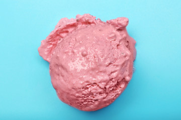 Delicious strawberry ice-cream on color background